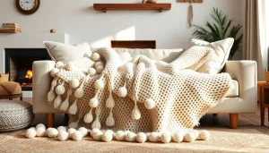 Cozy Moroccan Cotton Pompom Blankets perfectly styled on a sofa in a warm living room.